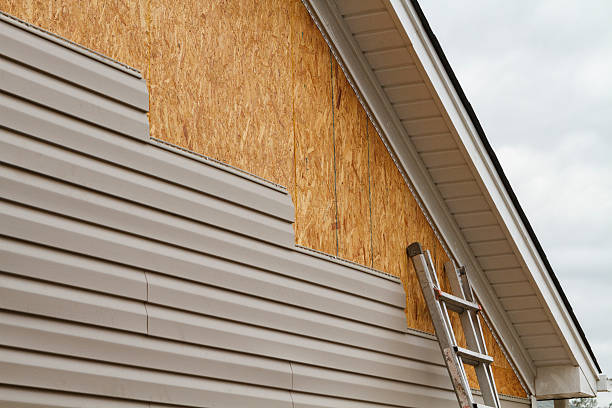 Professional Siding Installation technician working in Curwensville, PA